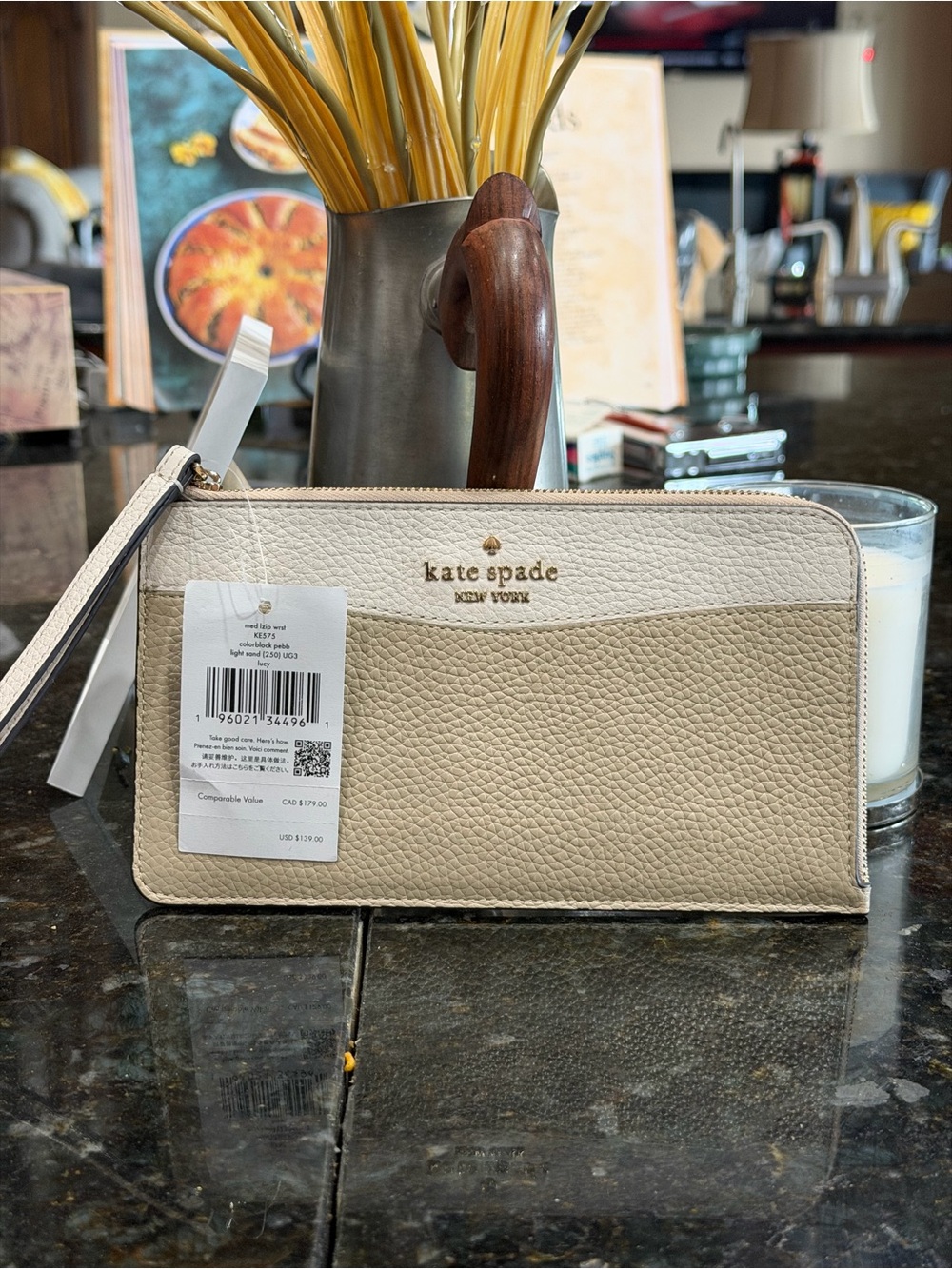 Kate Spade Two-Tone Cream & Beige Pebbled Leather Wristlet
MSRP-$139.00